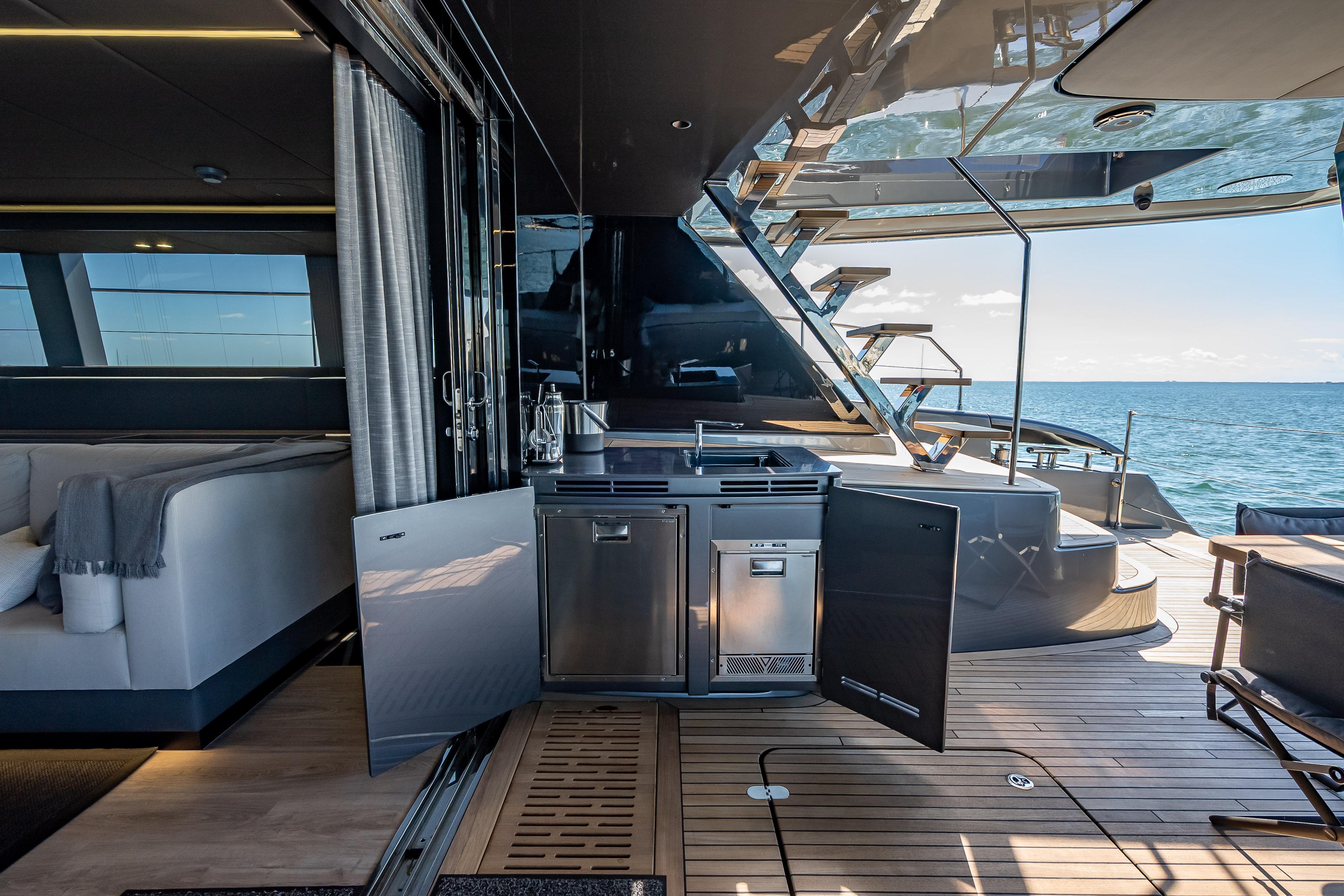 Luxurious Sunreef 60 Power yacht interior with modern kitchen and ocean view, 2026 model.