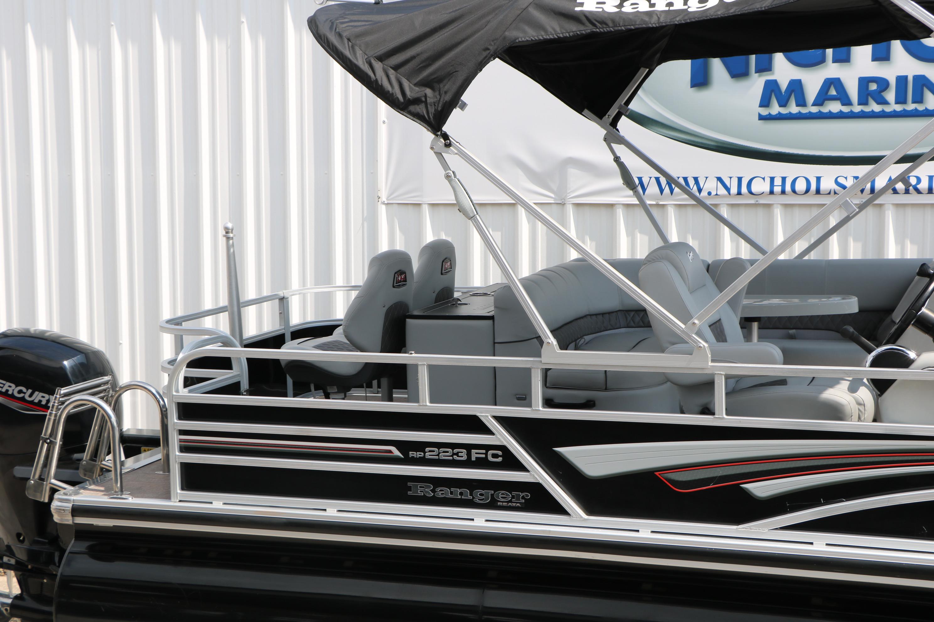 2021 Ranger 223FC pontoon boat with canopy and seating, displayed at Nichols Marine.