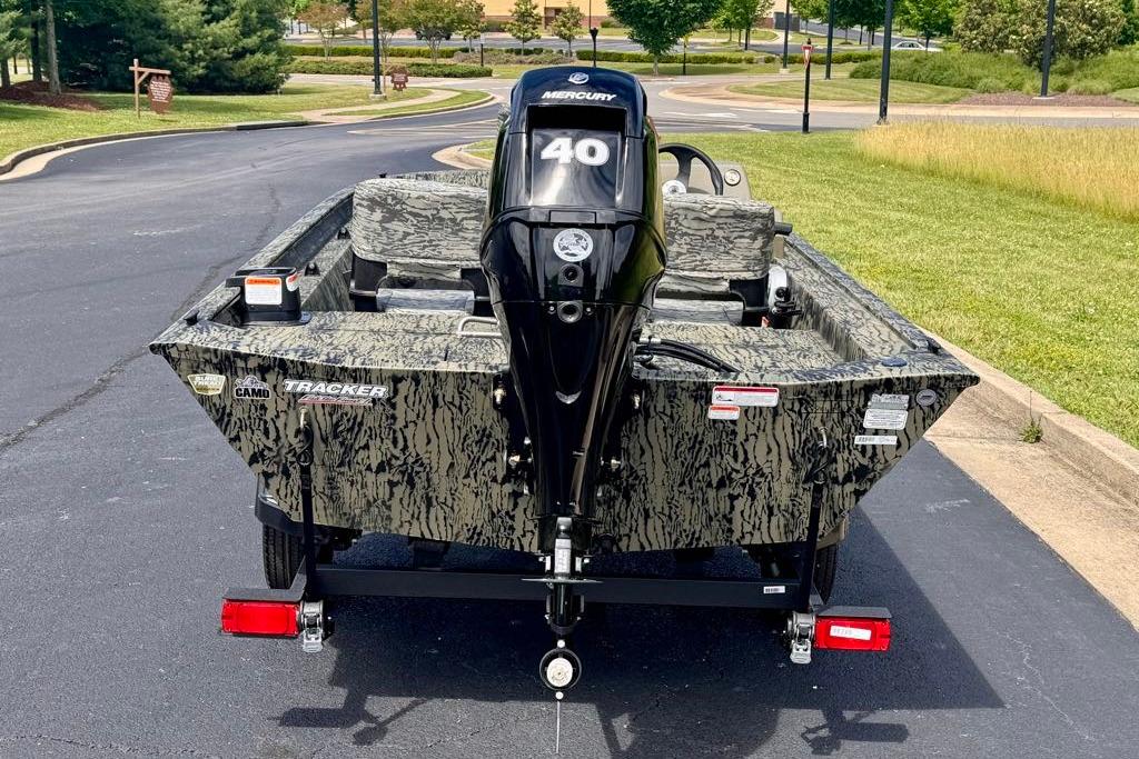2026 Tracker Grizzly 1754 SC boat with camo design and Mercury 40 engine.