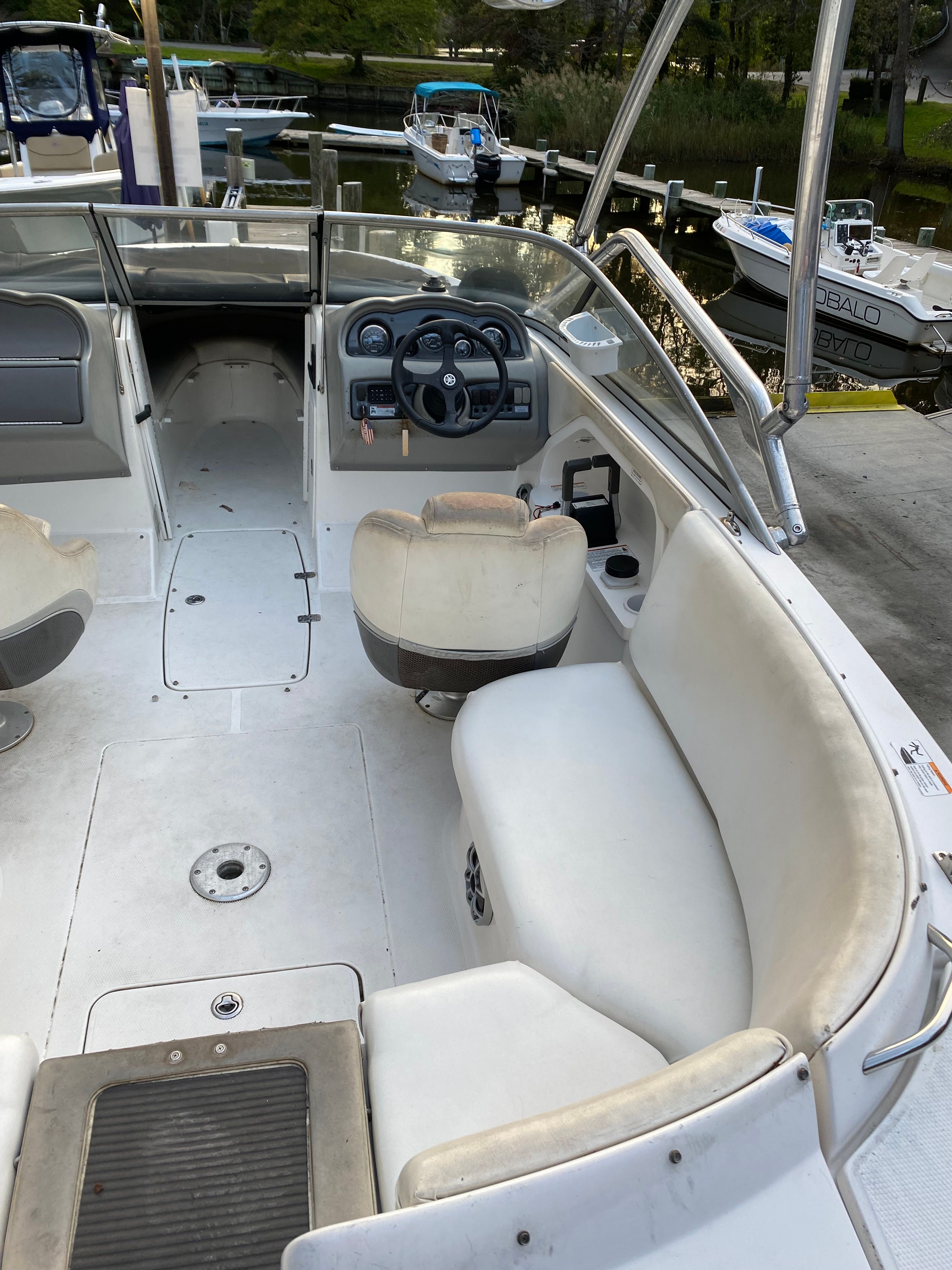 Interior of a 2005 Yamaha SX230 HO boat at the dock.