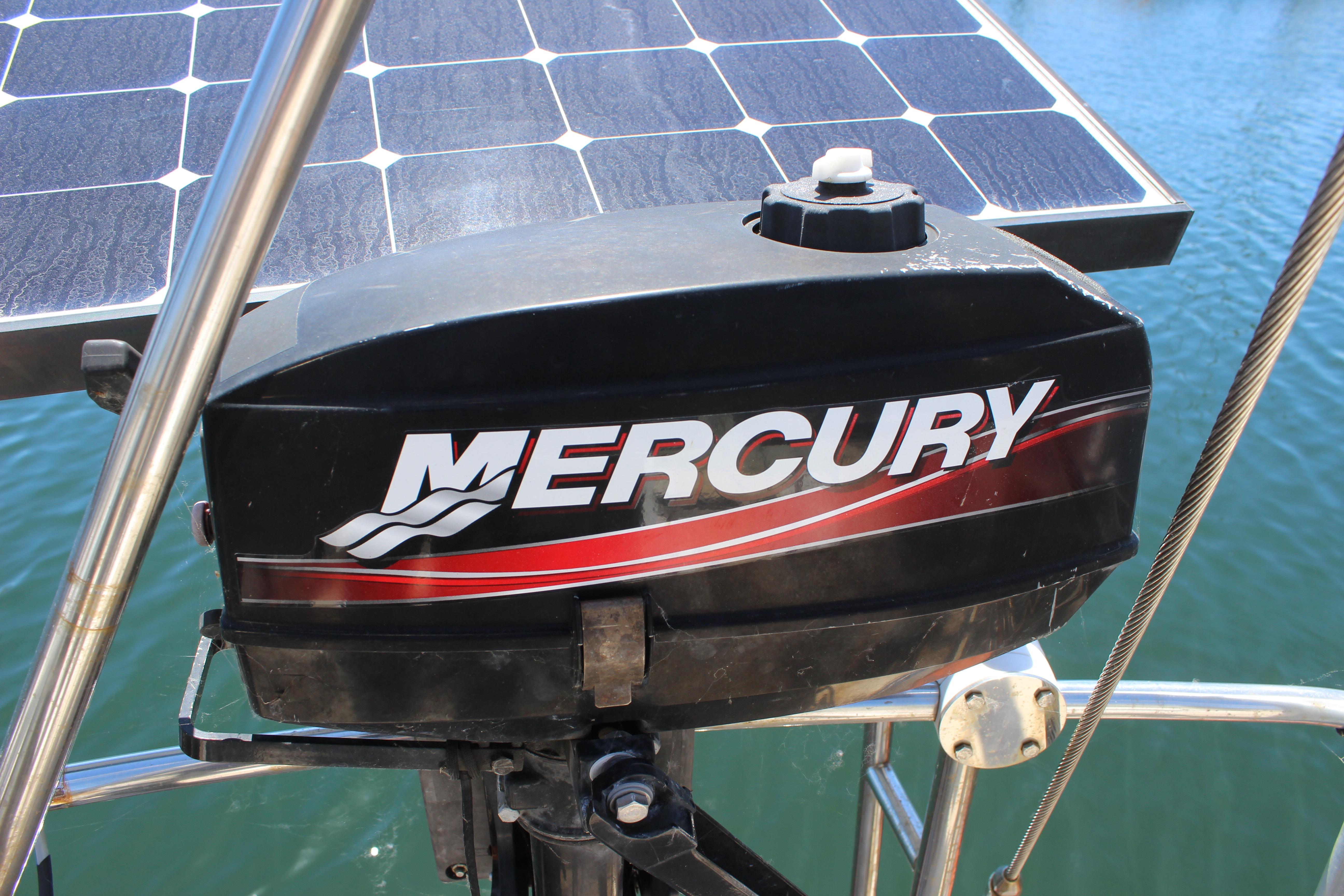 Mercury outboard motor on a 1981 Kelly Peterson 46 sailboat with solar panel.