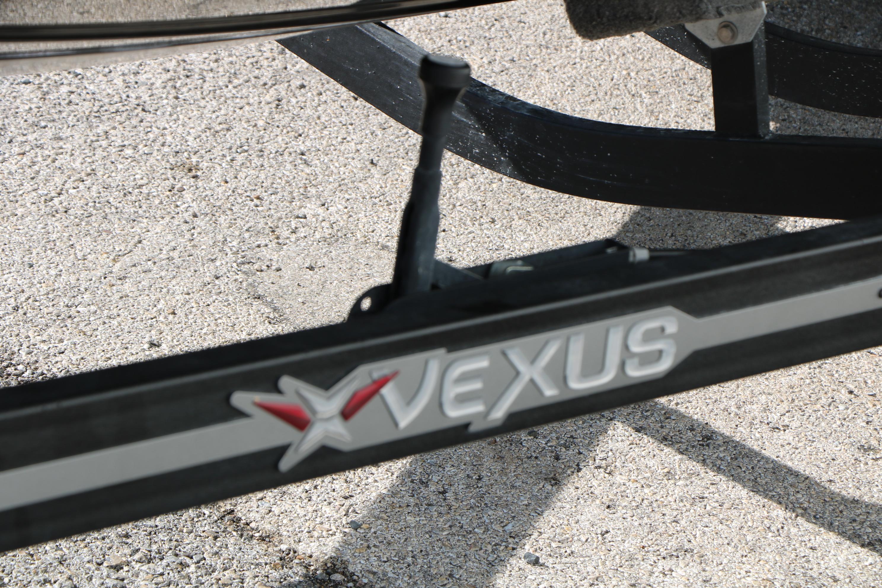 2022 Vexus VX21 boat trailer with logo on textured pavement background.