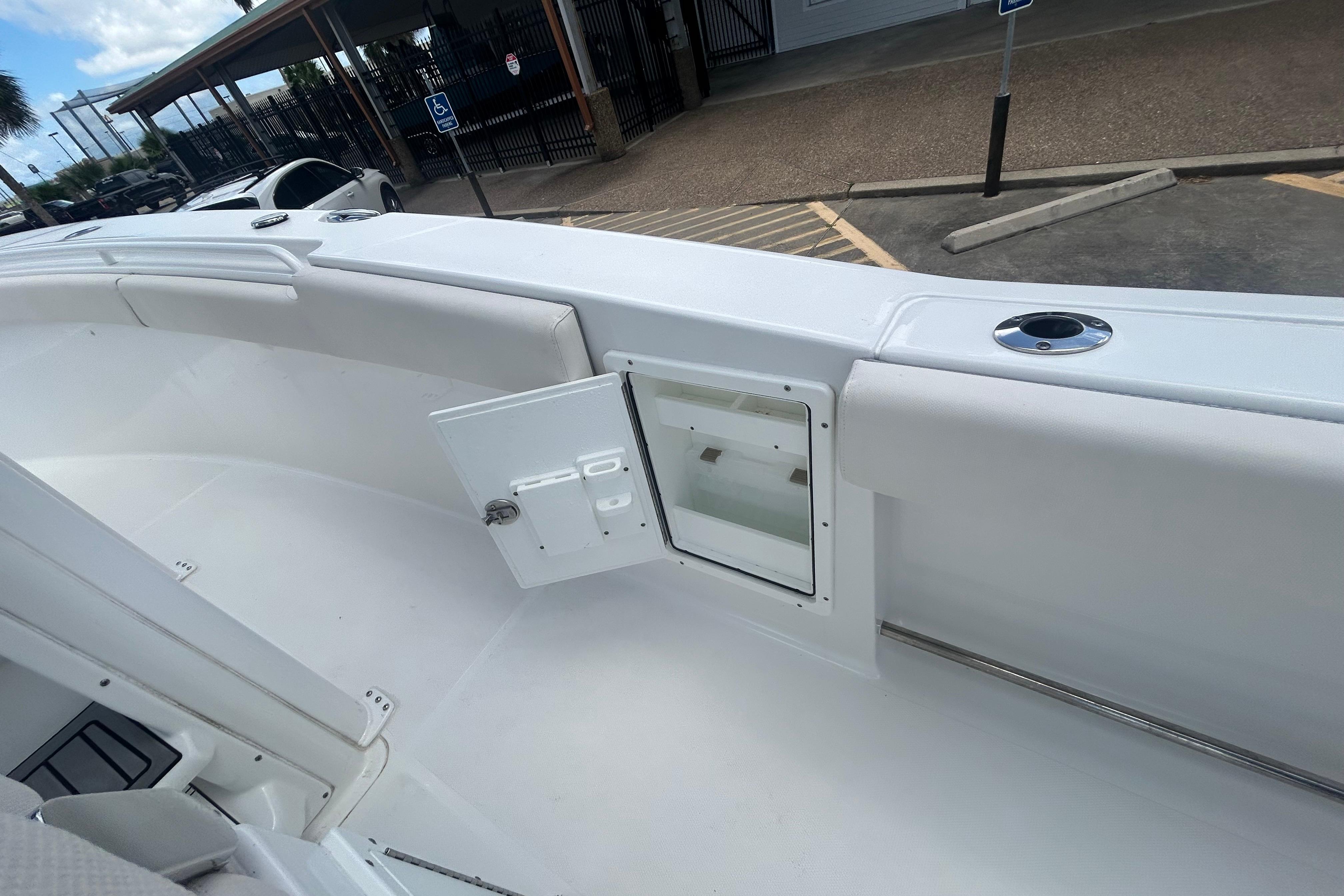 2023 Sea Hunt Gamefish 27 Coffin Box boat interior with open storage compartment.