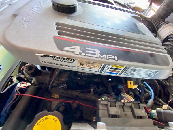 Engine compartment of a 2011 Premier 275 Grand Majestic PTX with a 4.3 MPI Mercury MerCruiser engine.
