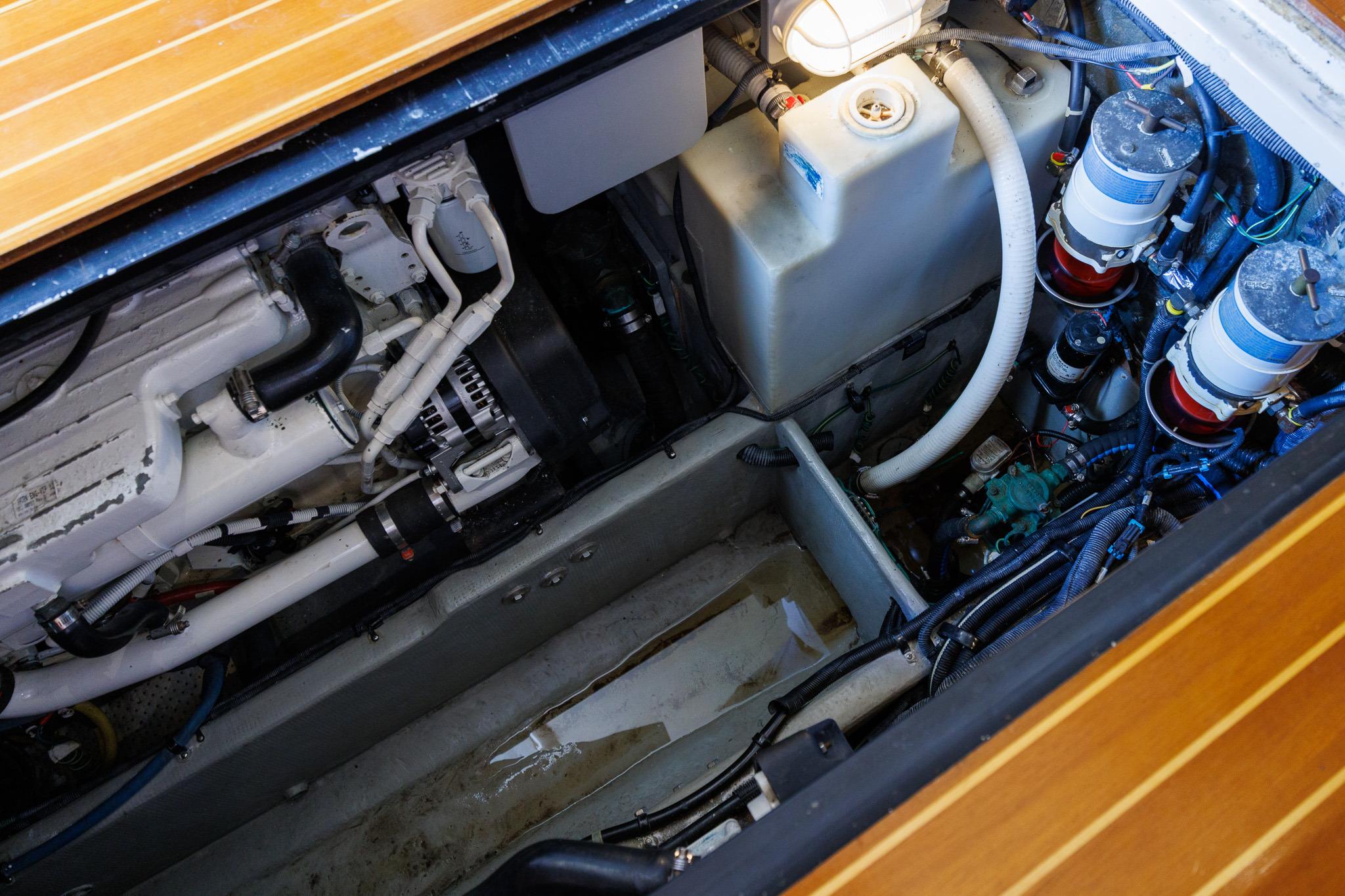Engine compartment of a 2010 Meridian 391 Sedan, showcasing mechanical components and wiring.
