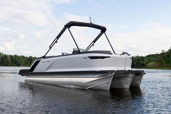 Manufacturer Provided Image: 2025 Manitou Cruise pontoon boat on calm water.