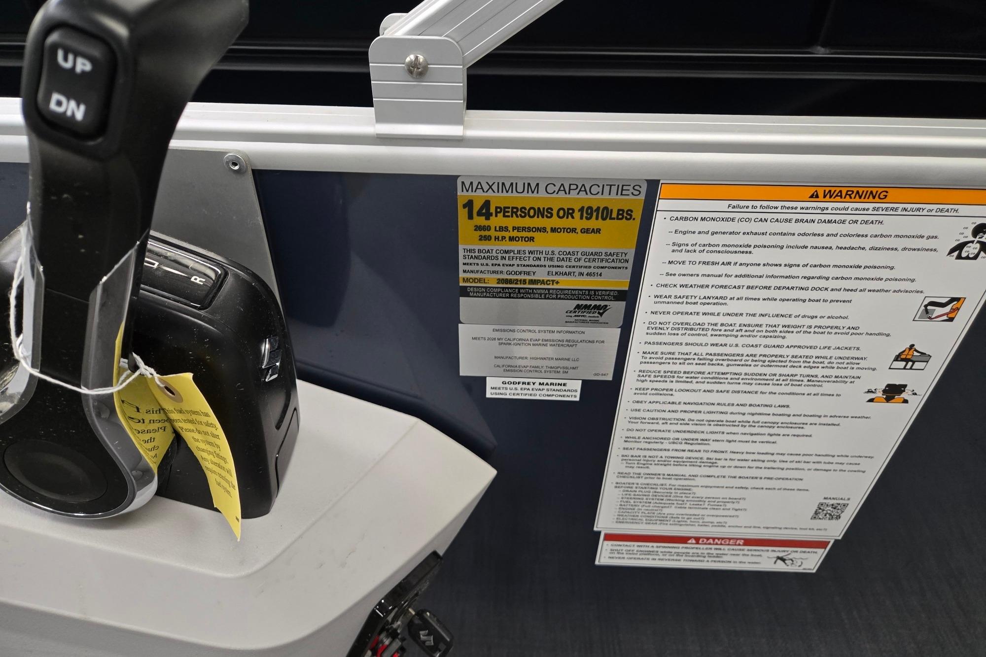 Control panel and capacity warning on 2026 Godfrey Sweetwater 2086 C boat.