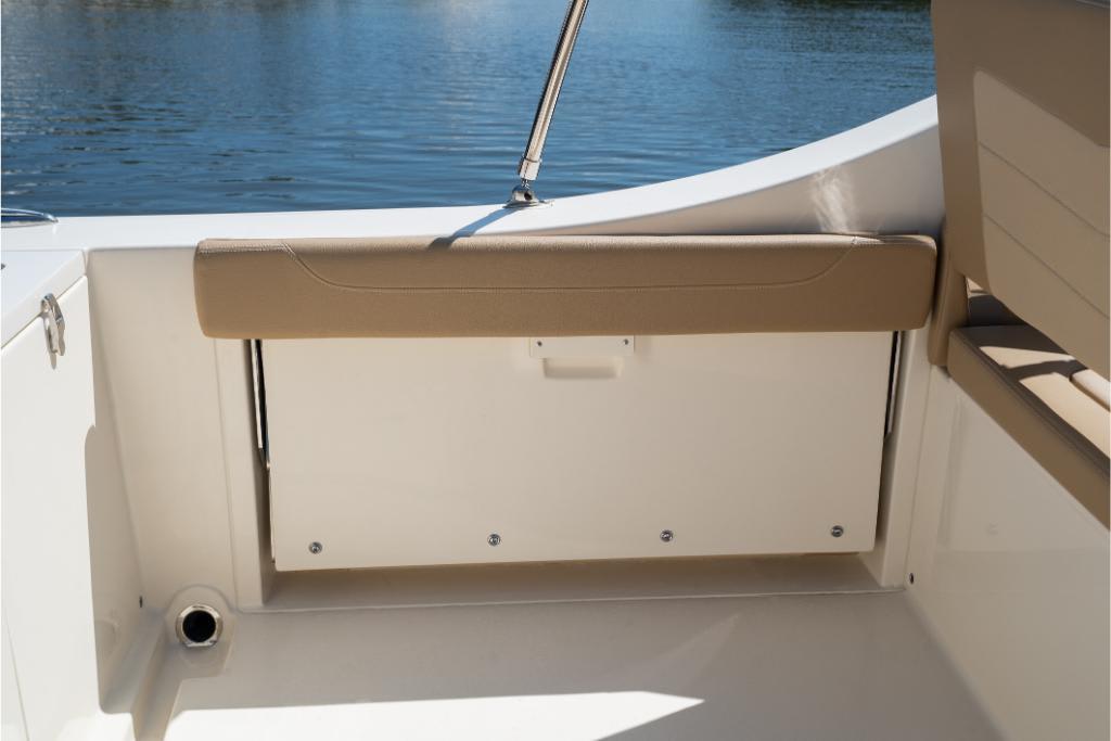 2023 Scout 240 Dorado boat interior with tan seating and water view.