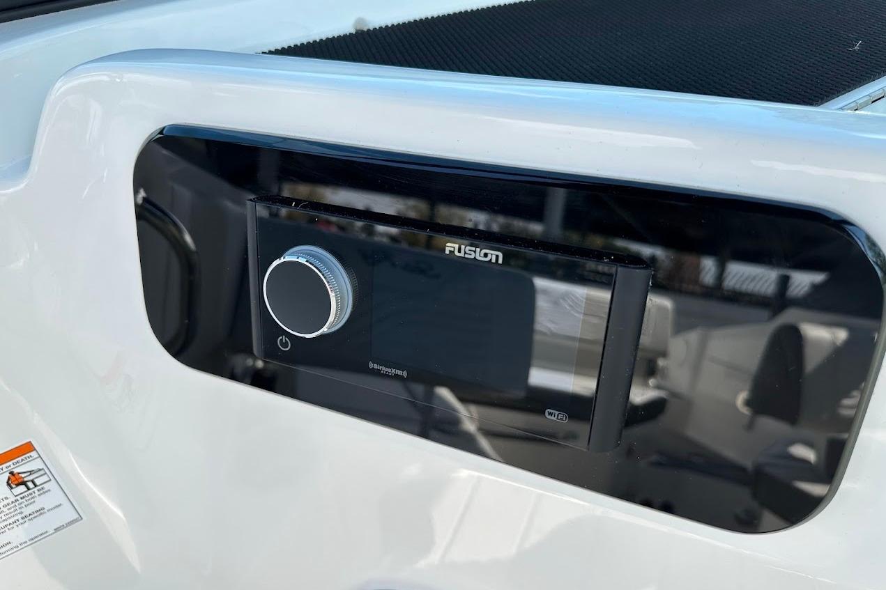 Fusion stereo system on 2026 Sea Ray SDX 230 Surf boat dashboard.