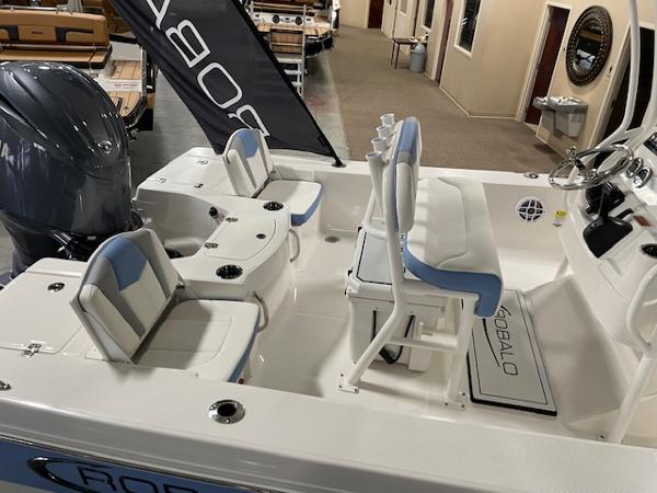 2025 Robalo 206 Cayman boat interior with seating and steering console.