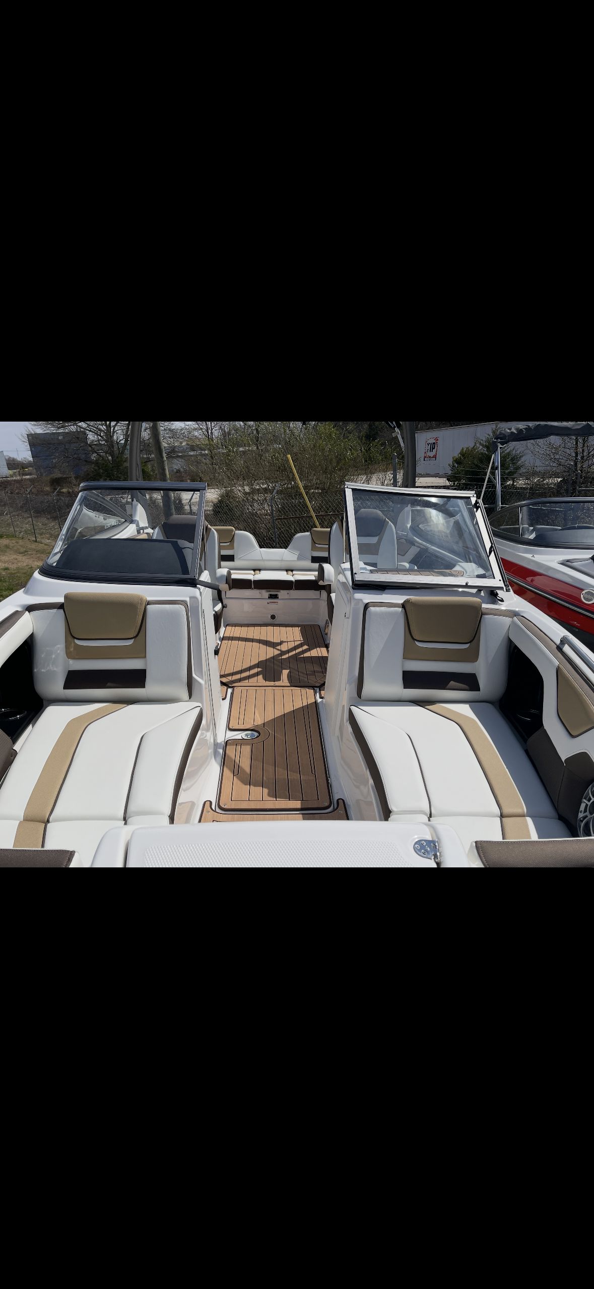 Interior view of a 2020 Yamaha Boats 212SE with sleek seating.