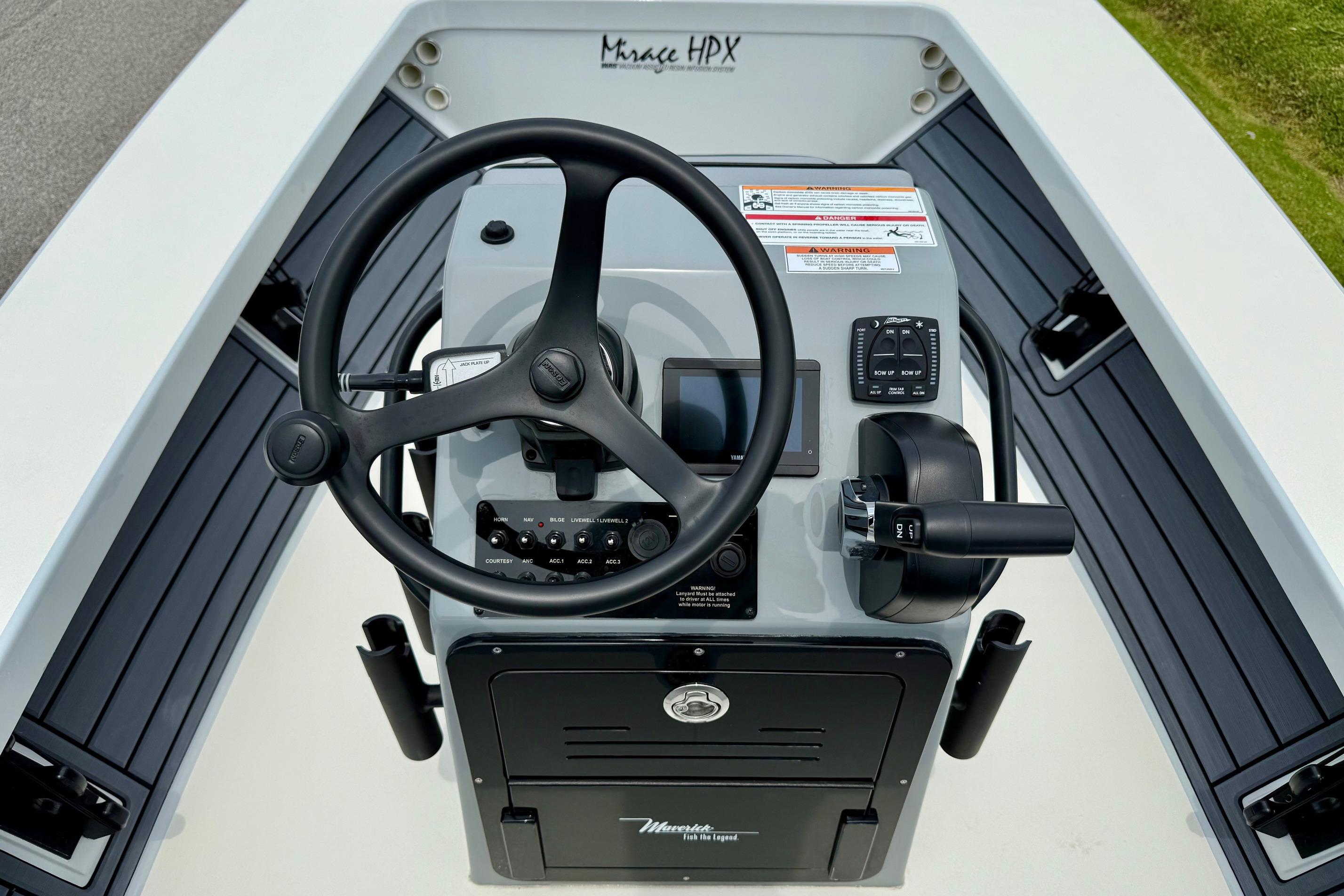 2026 Maverick 17 HPX-S boat console with steering wheel and controls.