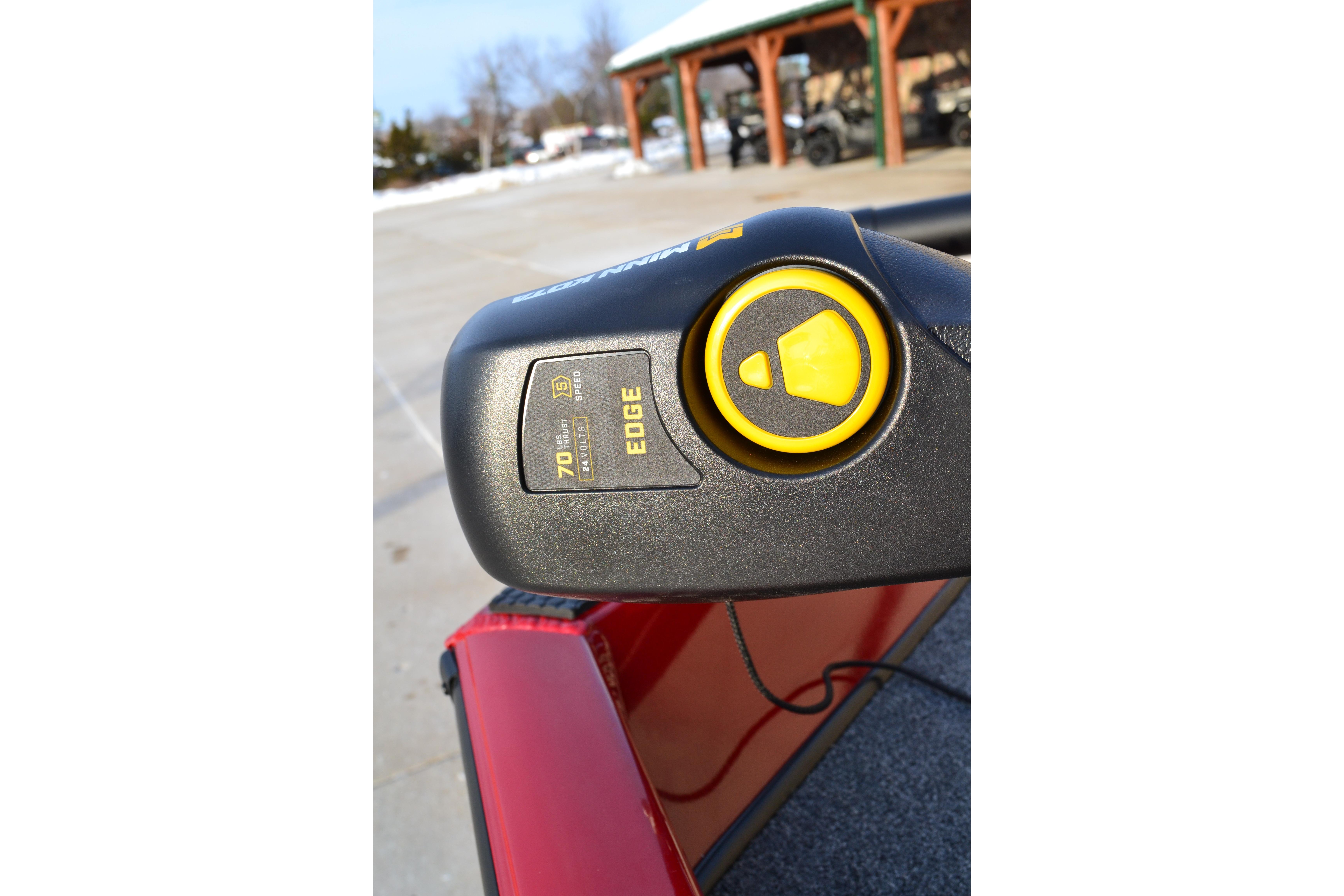 Close-up of 2026 Ranger RT188 boat control panel with yellow button and "Edge" label.