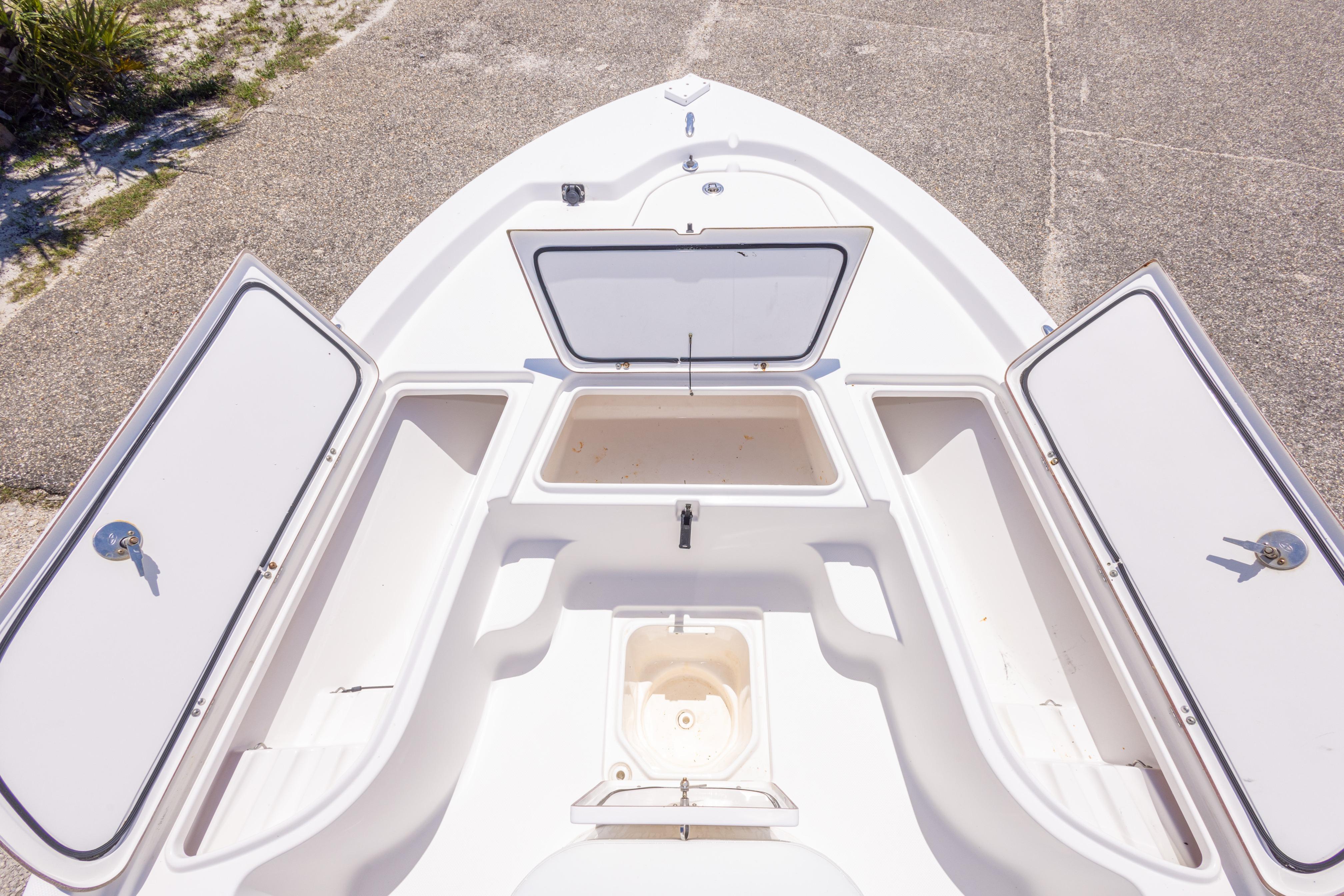 2011 Sea Fox 200XT boat storage compartments open, showcasing spacious design and functionality.
