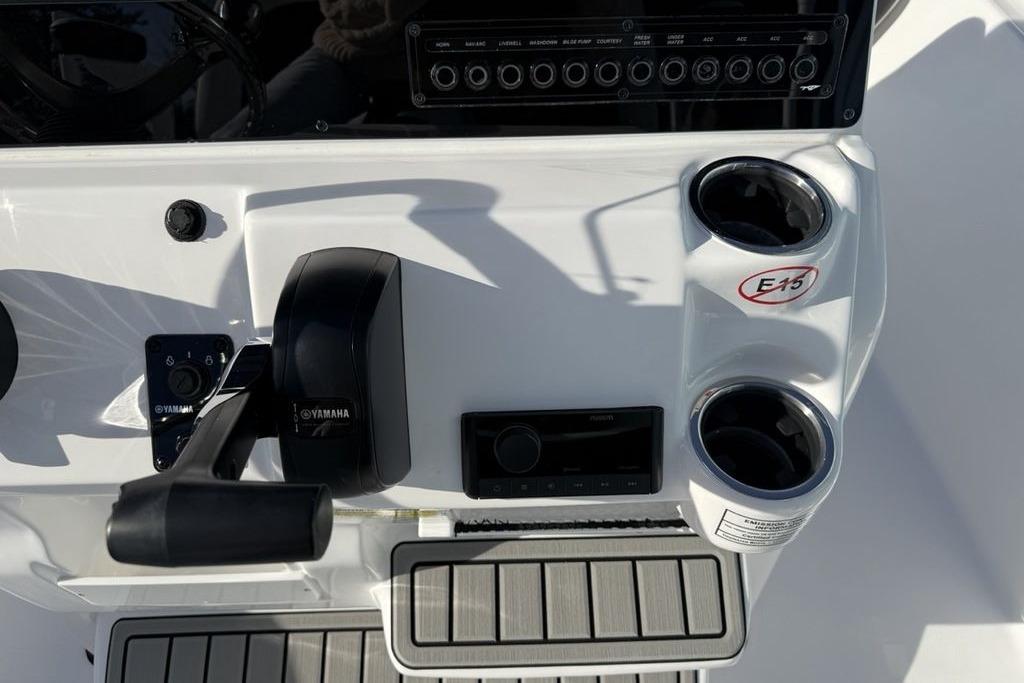 2026 Tidewater 198 CC Adventure boat console with Yamaha controls and cup holders.