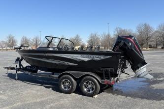 2025 Ranger VX1788 WT boat on trailer in parking lot, clear sky background.