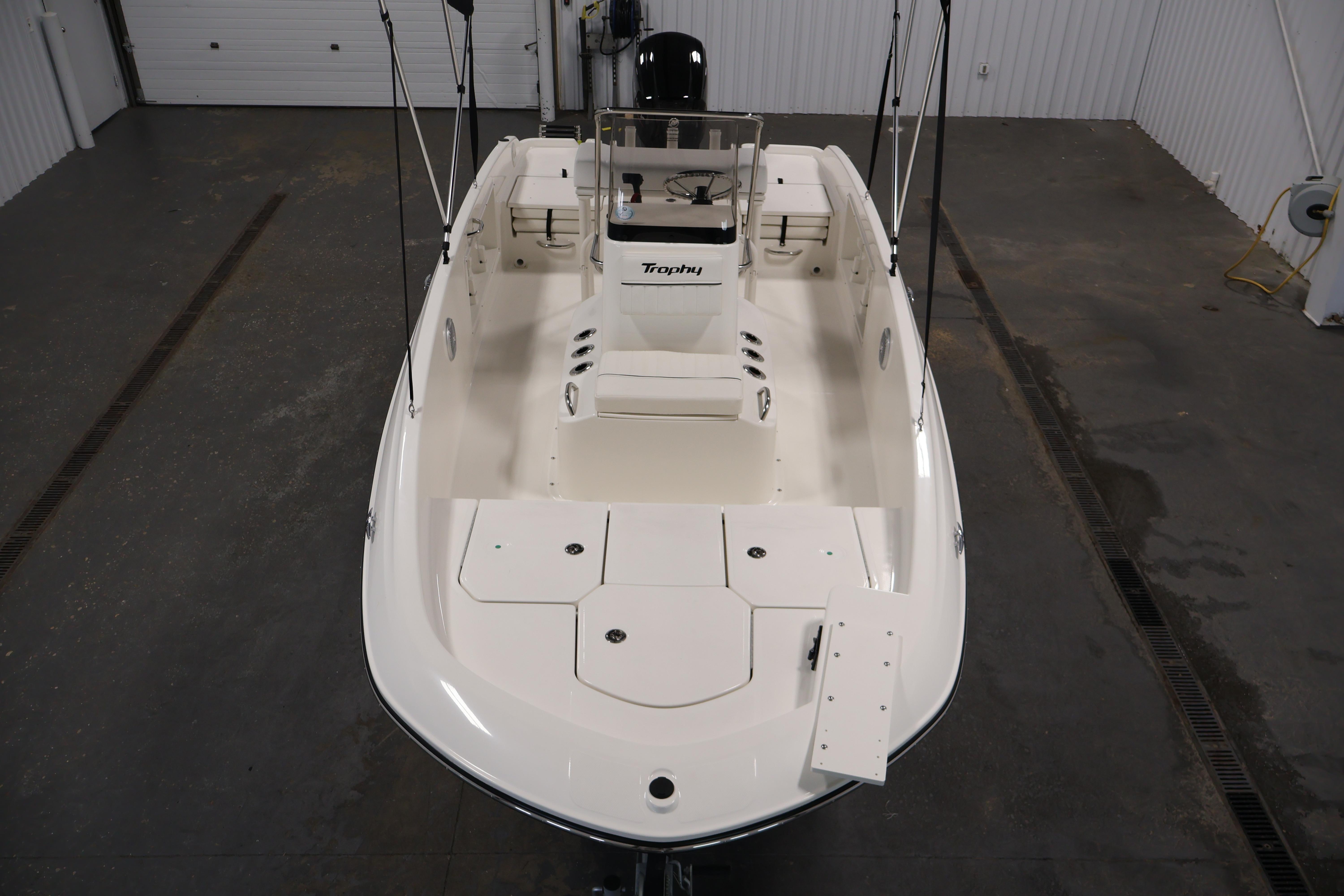 2026 Bayliner Trophy T18 boat in a spacious indoor setting, showcasing its sleek design.