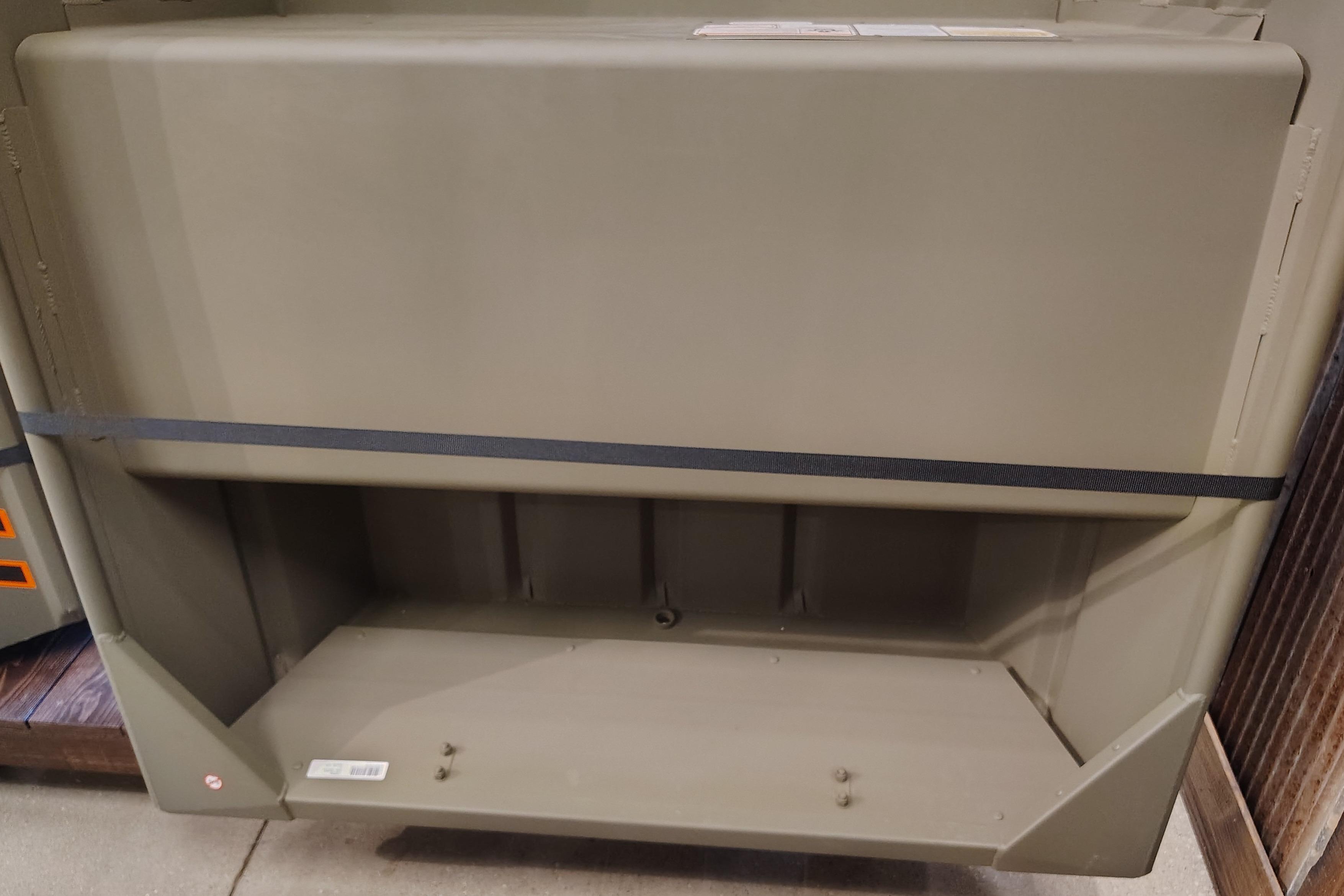 2026 Tracker Grizzly 12 Jon boat interior, showcasing storage compartment and seating area.
