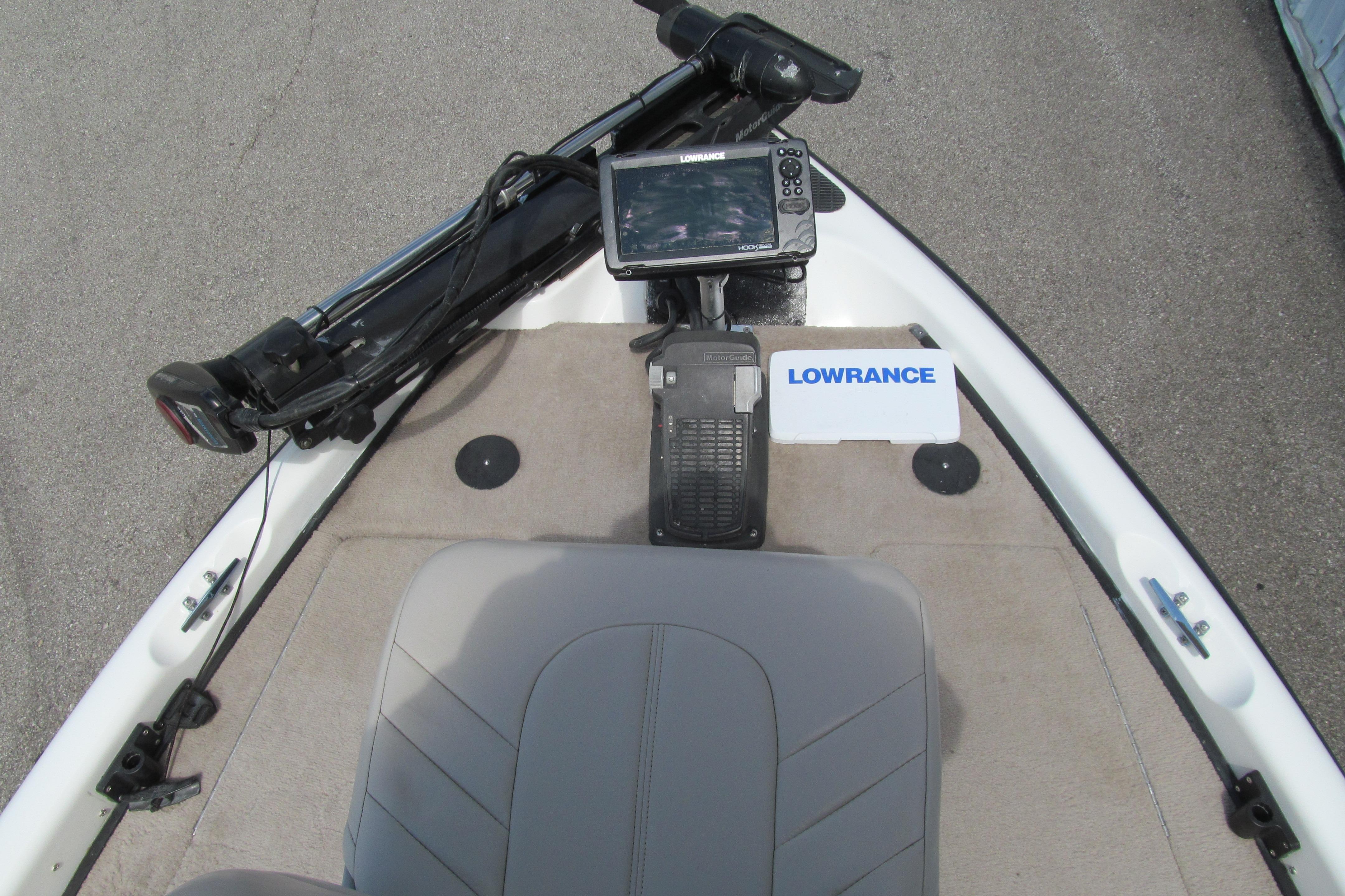 2002 Triton Tr-176 SC boat deck with Lowrance fishfinder and trolling motor.