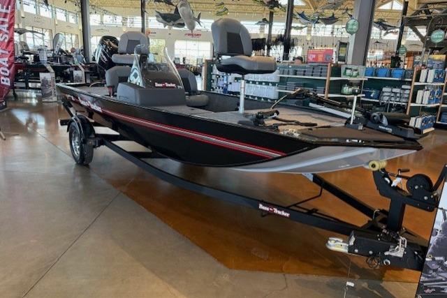 2026 Tracker Bass Tracker Classic XL boat displayed in a showroom.