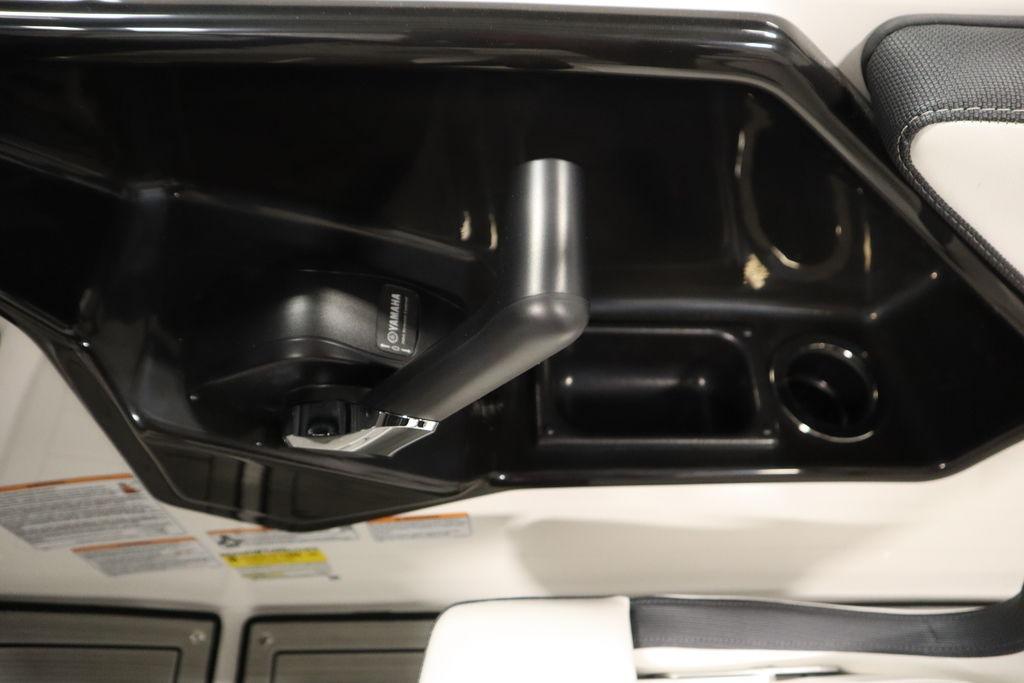 Interior view of 2026 Yamaha Boats 195S throttle control panel.