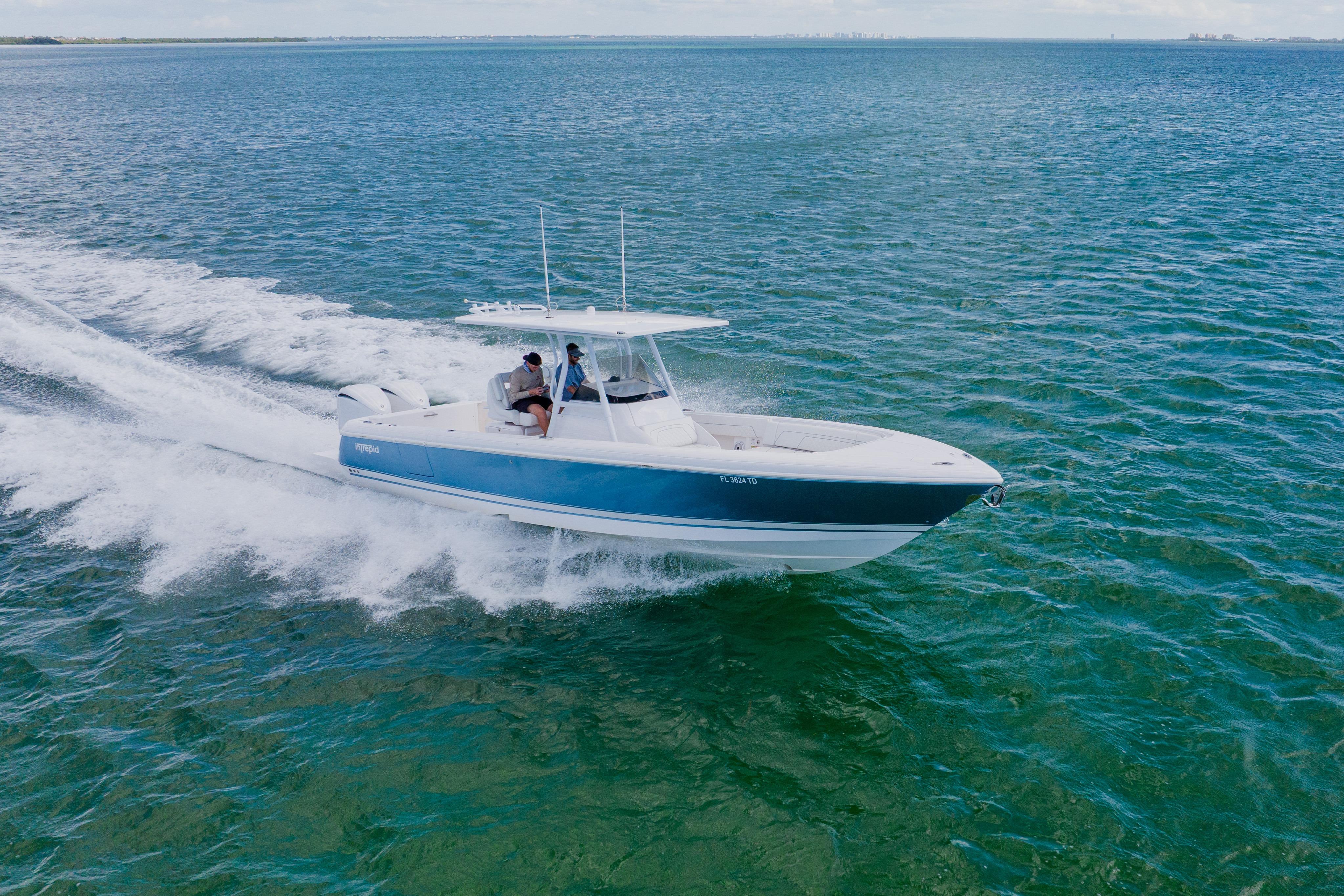 2018 Intrepid 327 Center Console boat cruising on open water.