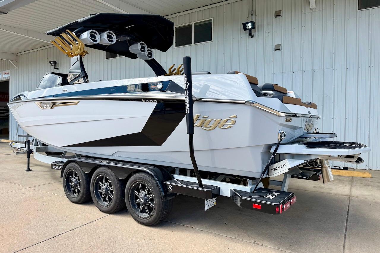 2025 Tigé Ultré 25ZX boat on a trailer, showcasing sleek design and modern features.