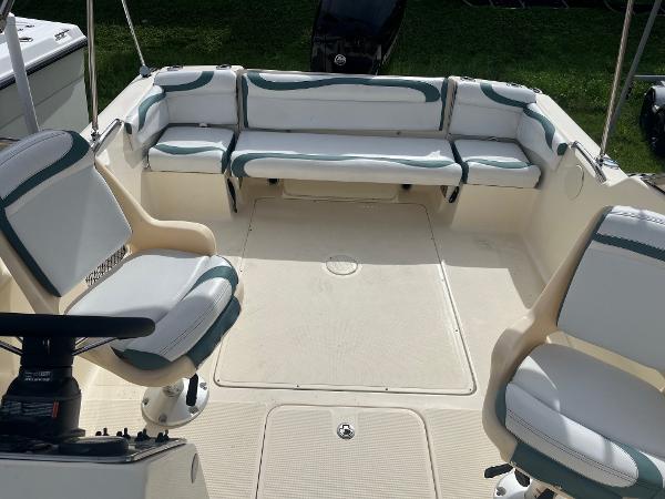 2021 Scout 210 Dorado boat interior with white and green seating.