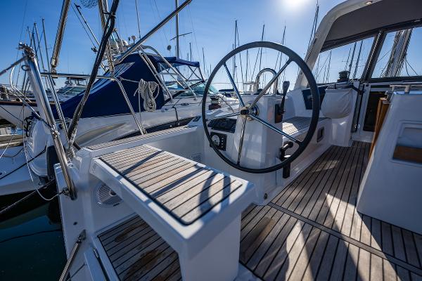 Cockpit of 2021 Beneteau Oceanis 38.1 yacht in marina.