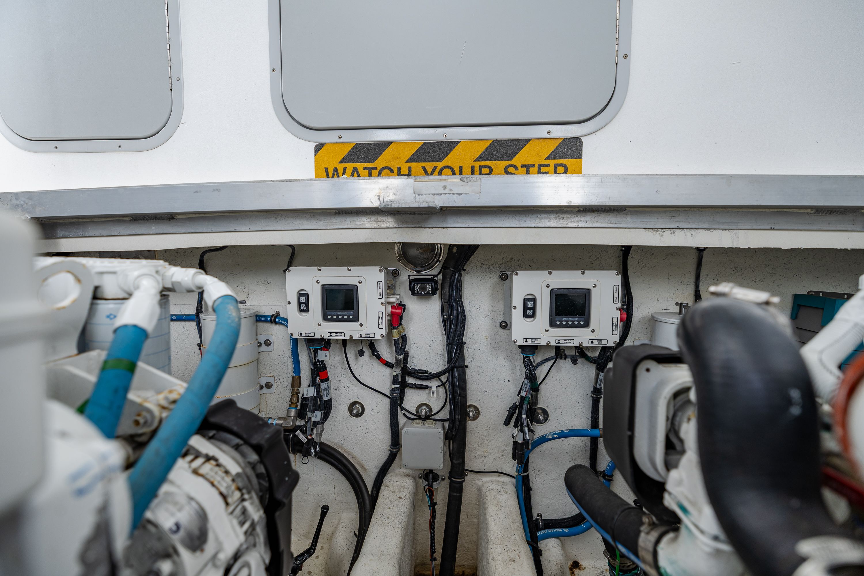 Interior view of the engine room in a 2019 Newton 36' Dive Special boat.