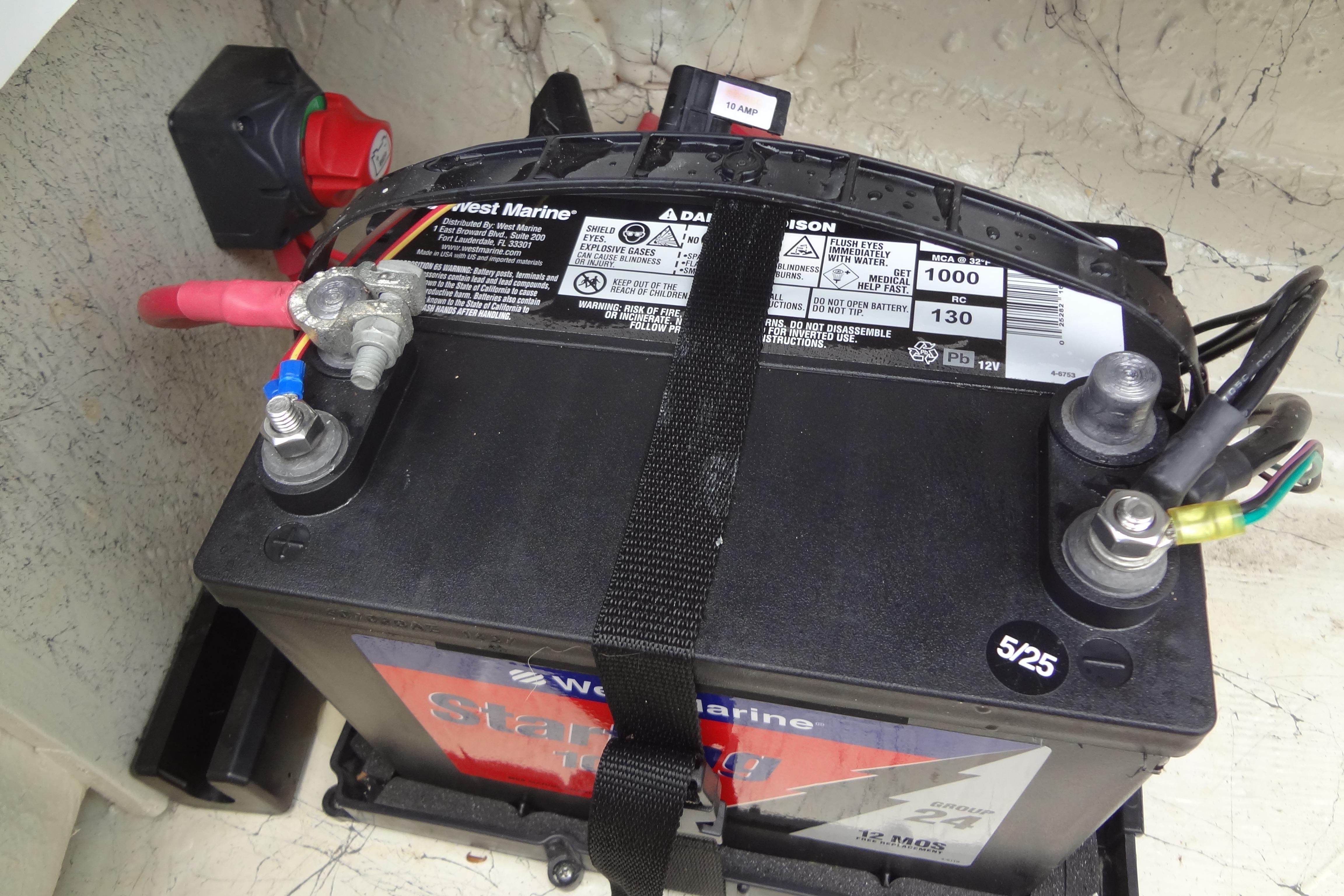 Marine battery installed in a 2022 Hurricane SunDeck Sport 185 OB boat.