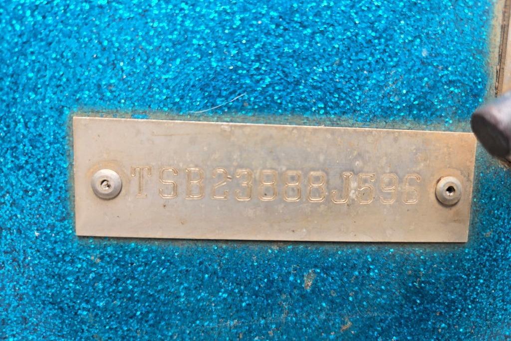 Metallic identification plate on blue surface, Champion 181 SX, 1996 model.