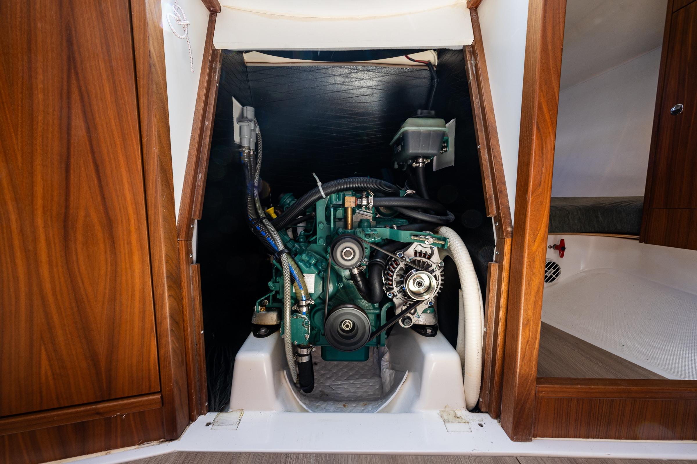 Engine compartment of 2018 J Boats J/97E sailboat, showcasing detailed mechanical components.