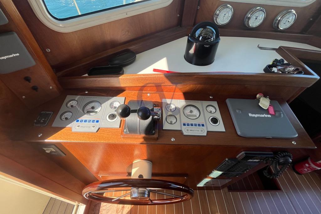 Control panel of a 2012 Sibma Navale Italiana Armstrong 12 boat with navigation instruments.