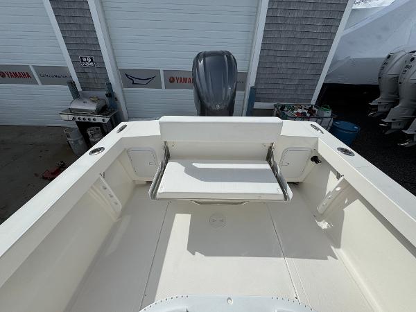 2025 NorthCoast 230 Center Console boat interior with seating and storage compartments.