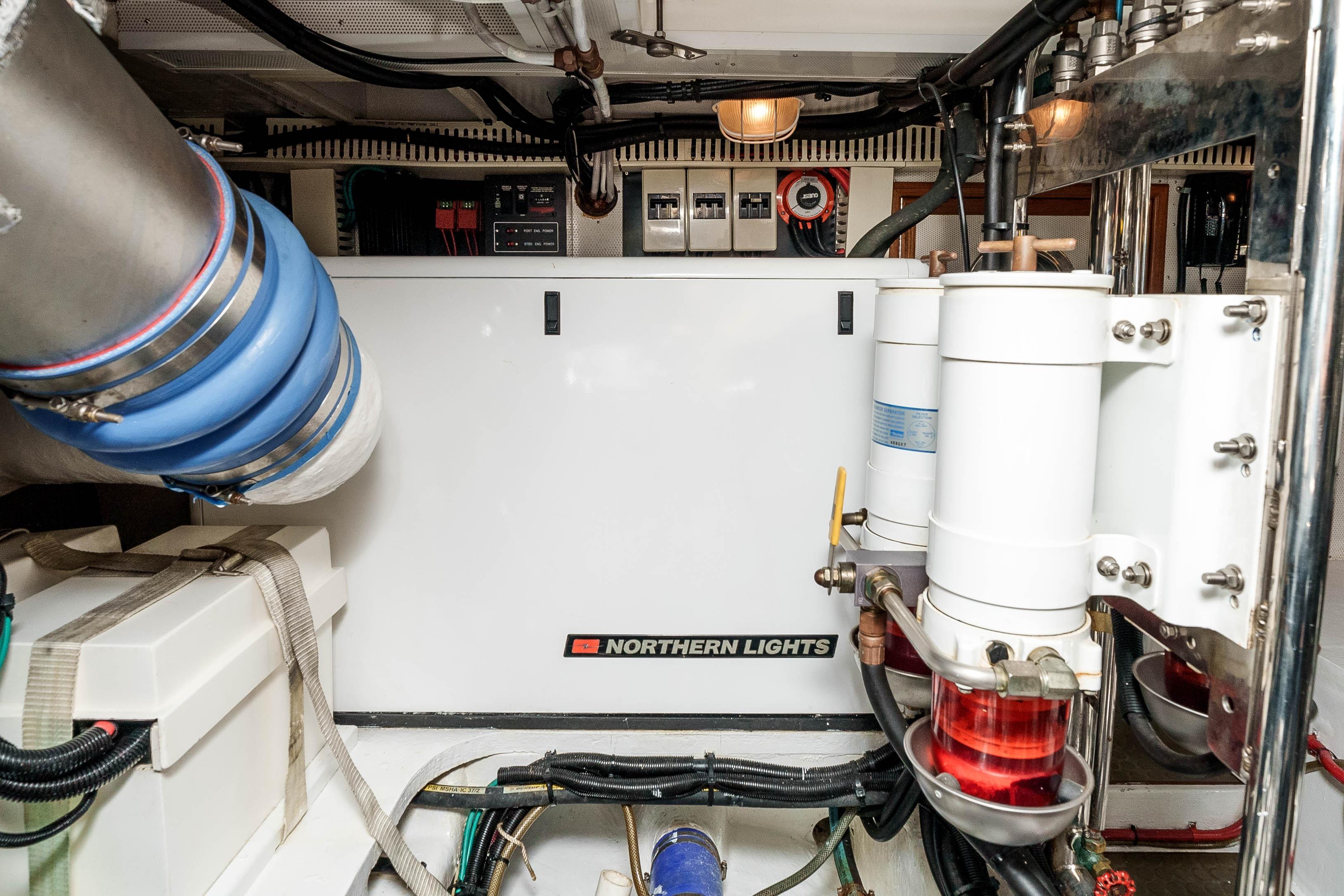 Engine room of 2005 Offshore Yachts 54 Pilothouse with Northern Lights generator.