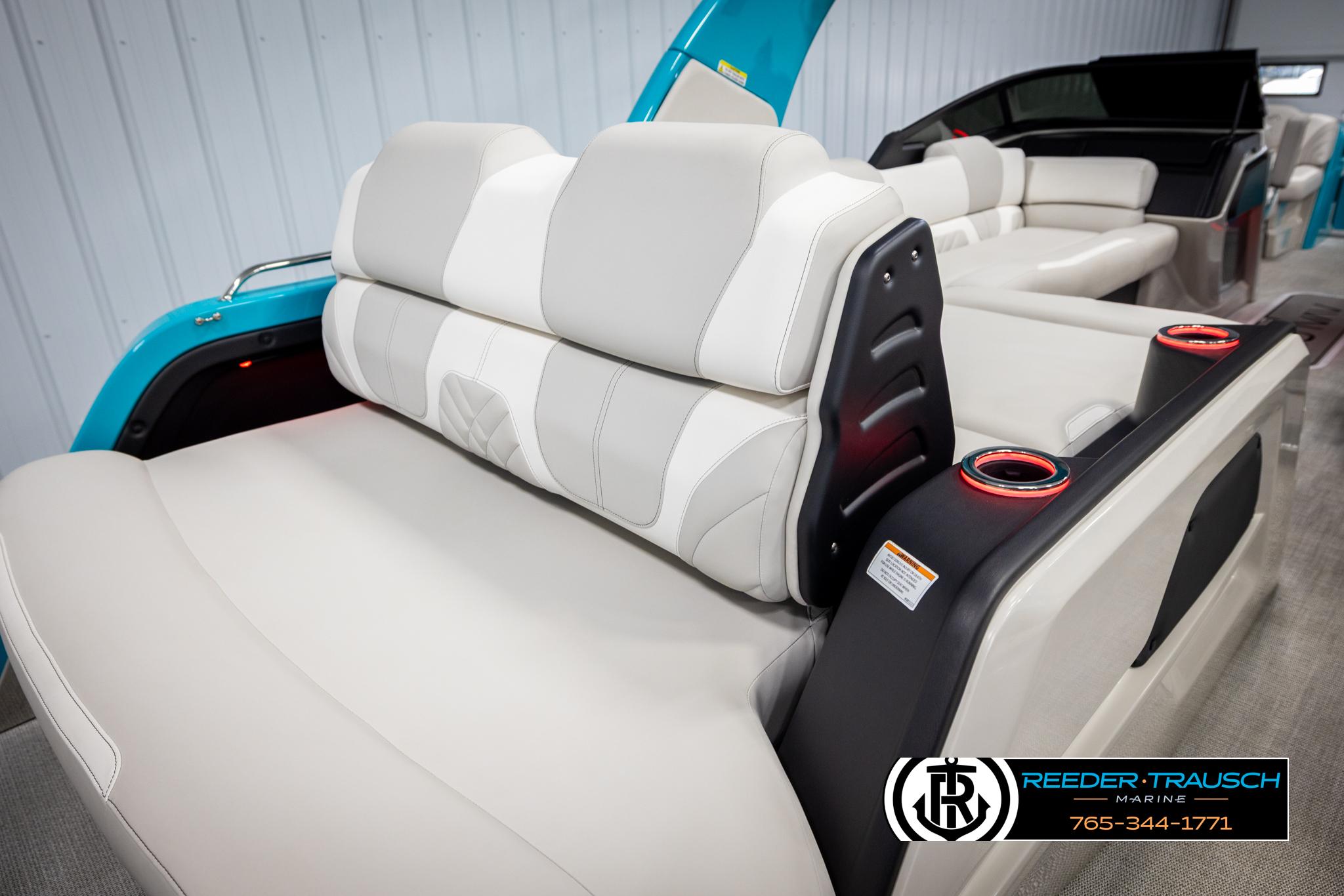 2025 Avalon 2585 Excal VRBW boat interior with luxurious seating and cup holders.