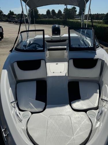 2025 Tahoe 200 S boat interior with open seating and canopy.