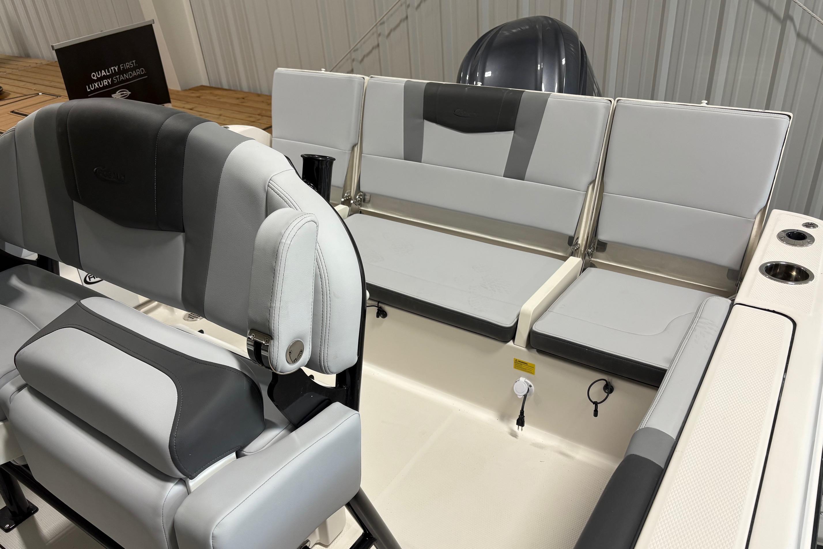 2025 Robalo R232 Explorer boat interior with gray seating and modern design.