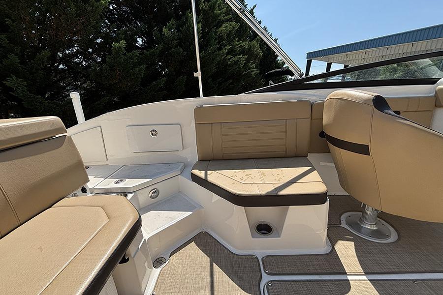 2019 Sea Ray SPX 230 Outboard boat interior with tan seating and modern design.