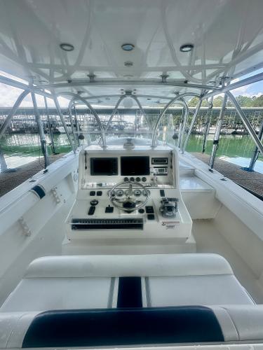 2008 SeaVee 390B boat cockpit with steering wheel and navigation controls.