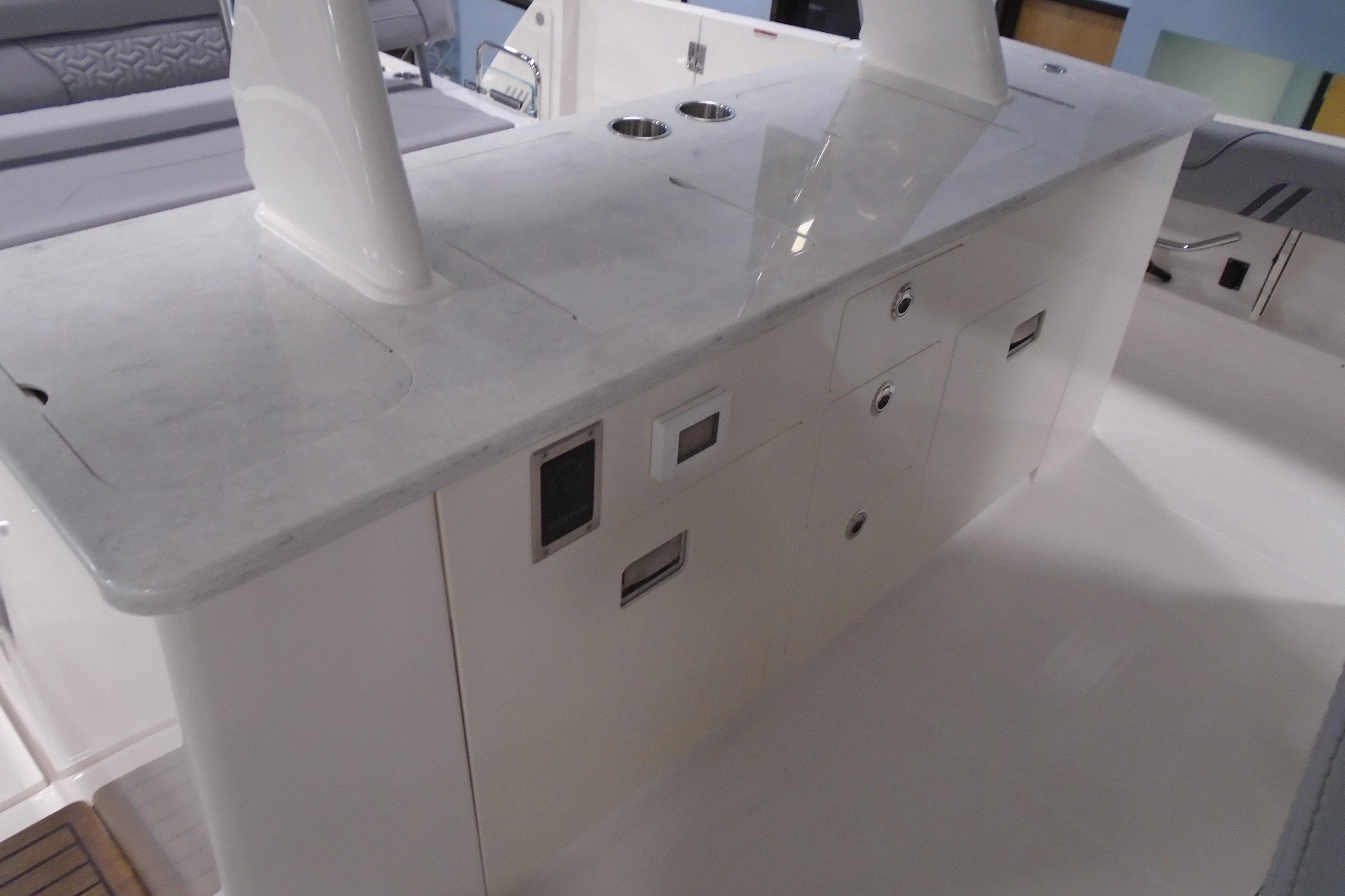 2026 Regal 38 SAV yacht interior with sleek white cabinetry and modern design.