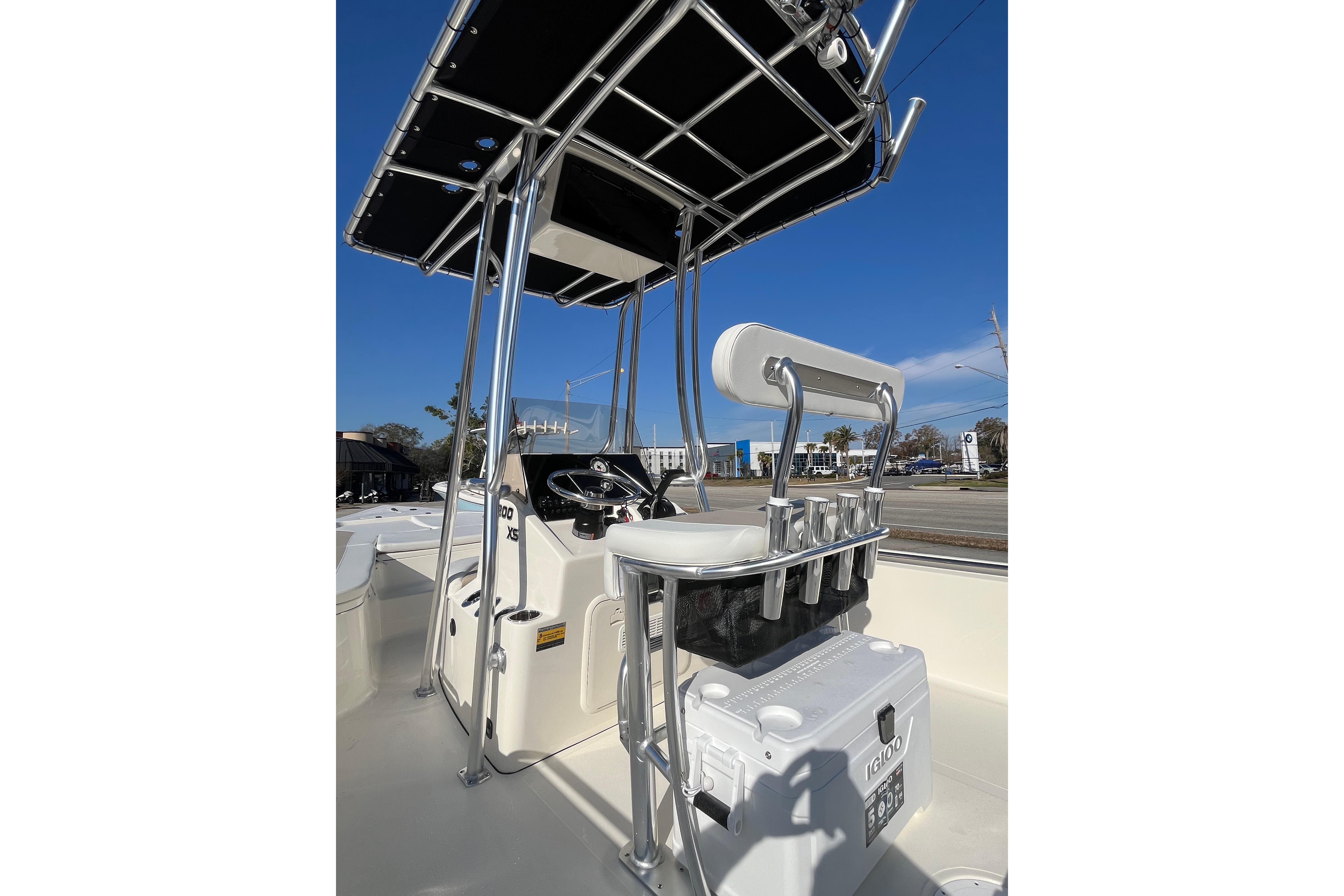 2026 Bulls Bay 2200 boat interior with T-top and seating, showcasing modern design.