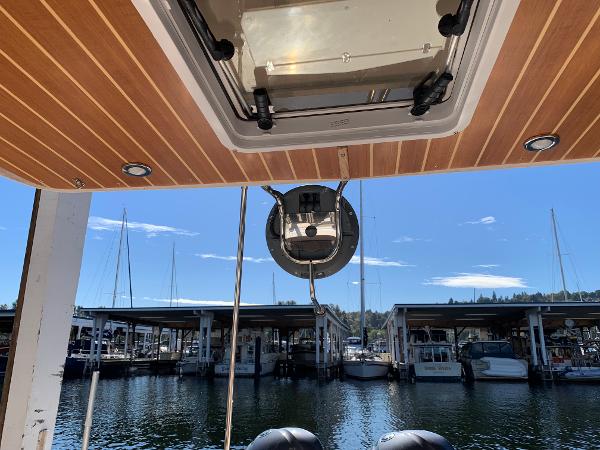 2021 Cutwater C-32 CB boat interior view with marina backdrop.