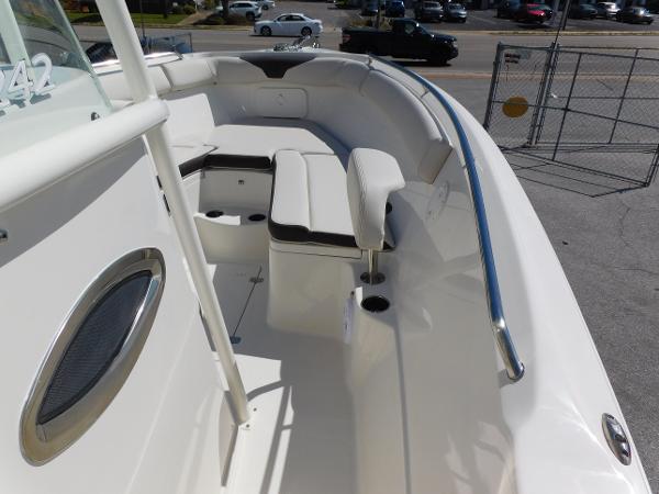 2024 Sailfish 242 CC boat interior with seating and railing.