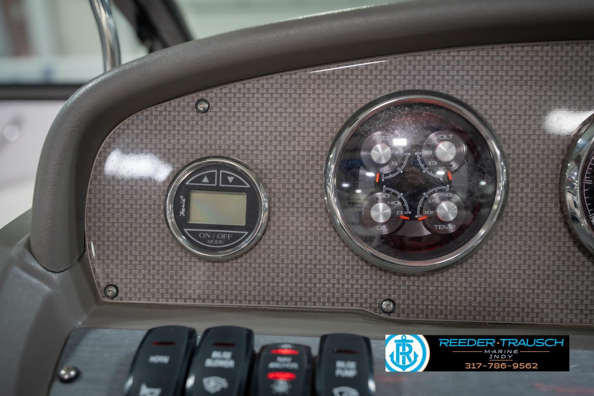 Dashboard of a 2015 Regal 2000 ESX Bowrider with gauges and controls.
