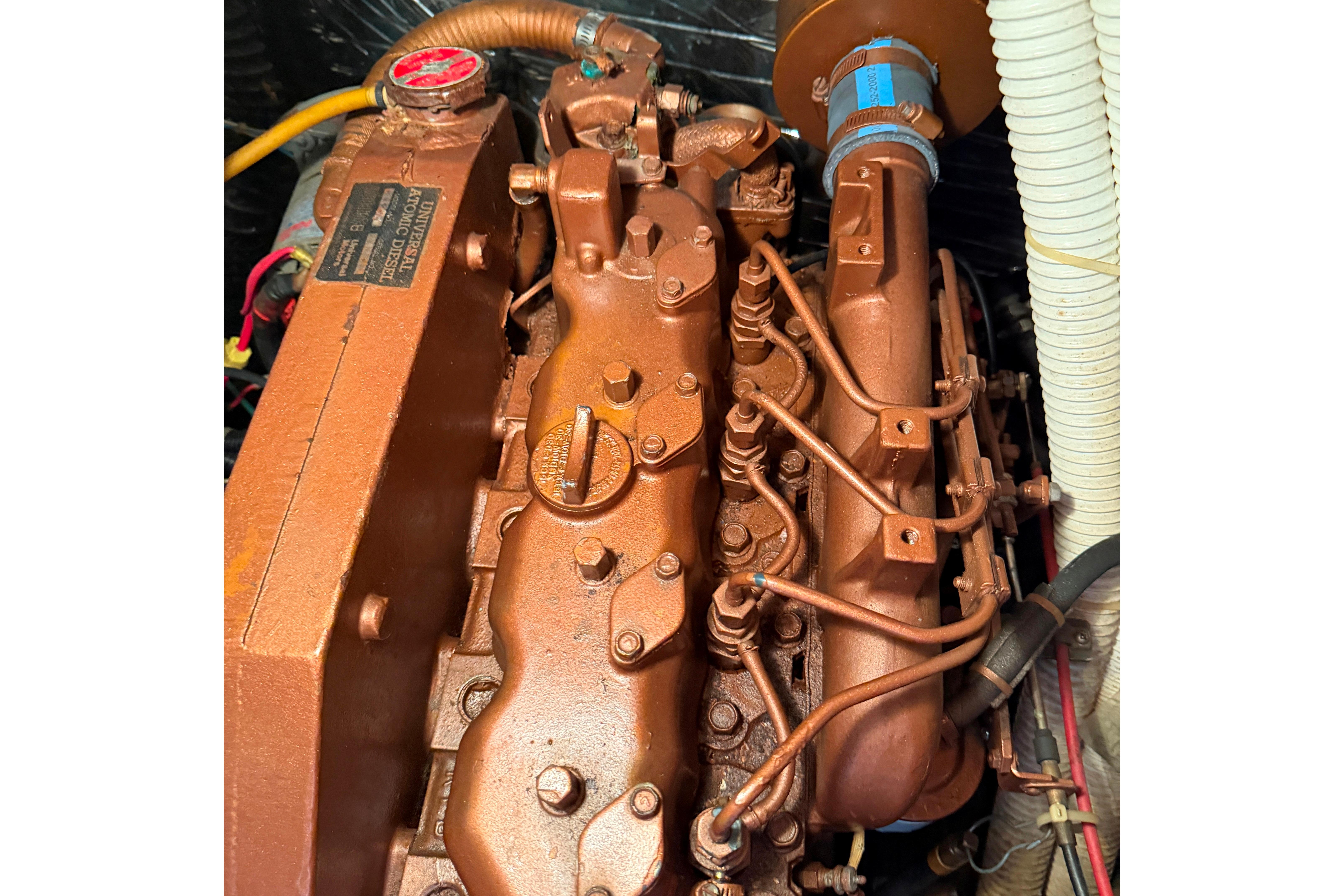 1989 Nonsuch 36 engine, detailed view of diesel components and wiring.