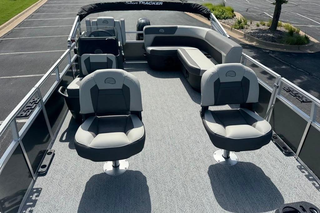 2026 Sun Tracker Bass Buggy 16 XL Select pontoon boat with spacious seating and modern design.