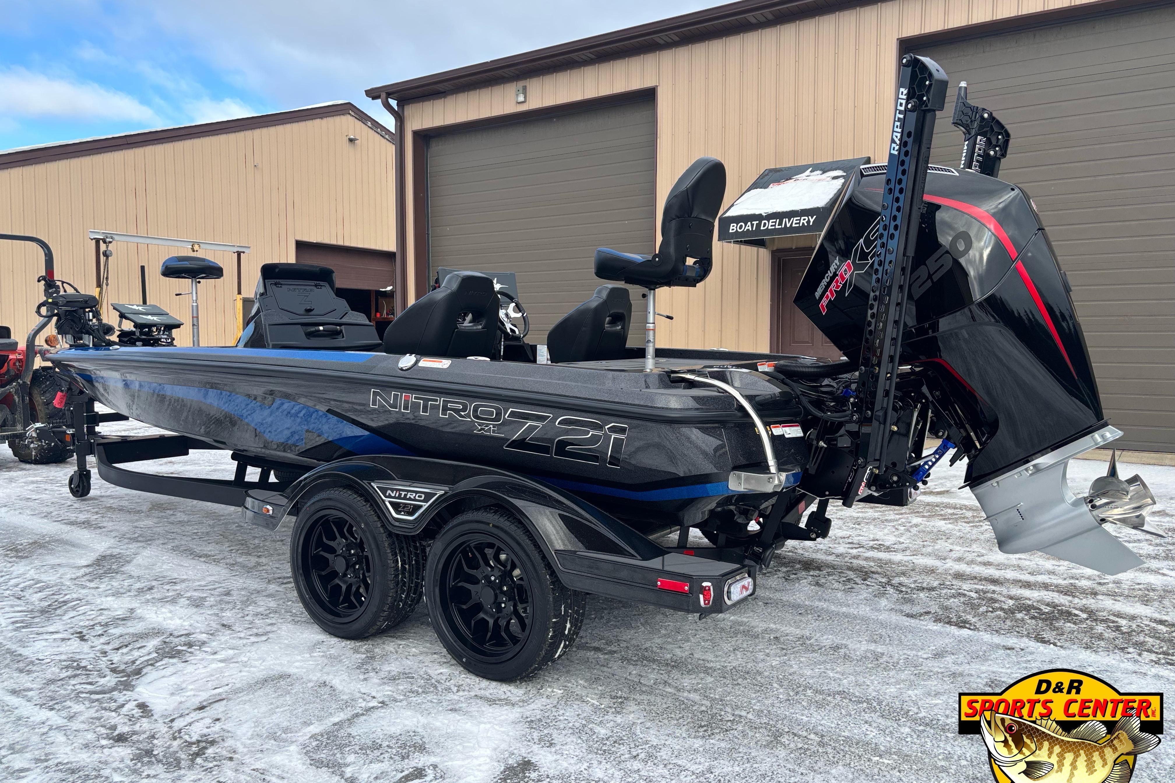 2026 Nitro Z21 XL boat with powerful engine, parked on snowy ground.