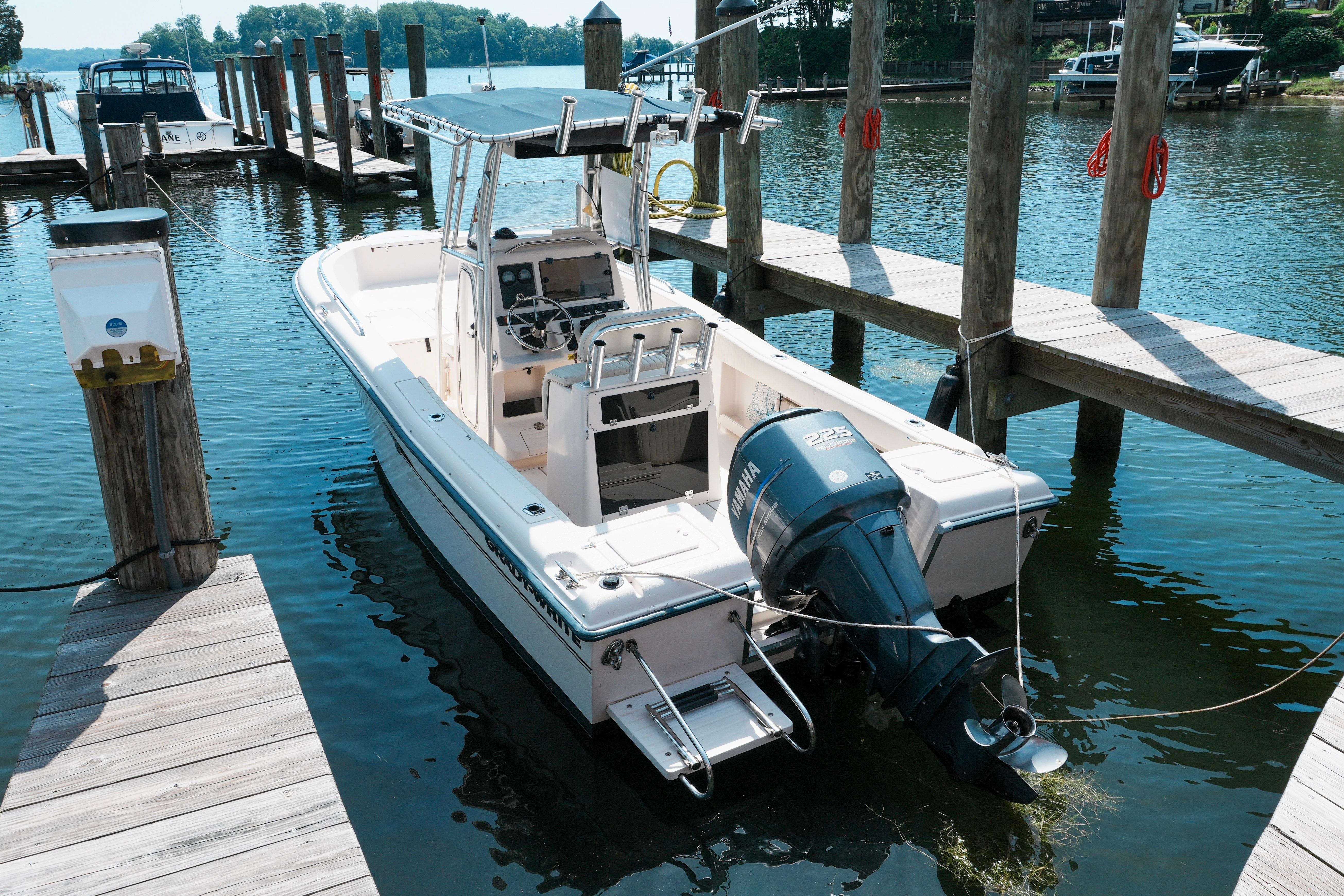 2003 Grady-White Fisherman 222 boat docked on a sunny day.